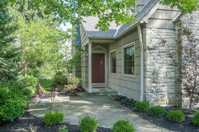 Stone patio near front entry