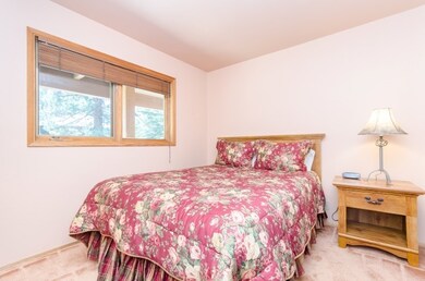 Both guest bedrooms and a guest bath are located o