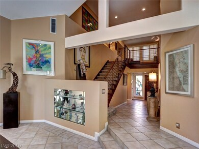 View from entry foyer stepdown to living room