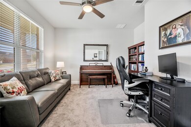 The executive study offers plenty of space and even a nook for your bookcase.