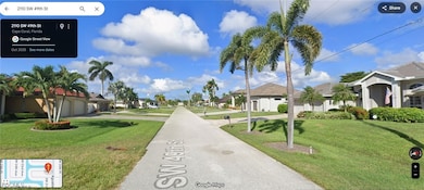View of asphalt road with a residential view