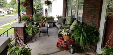 Spacious front porch w/shade on left side for added privacy