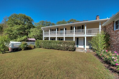 Side of Home With View of Front Porch with Beautiful Second Floor Balcony