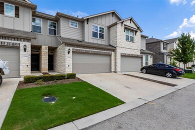 Townhome / multi-family property featuring board 