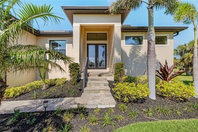 Doorway to property with stucco siding and french