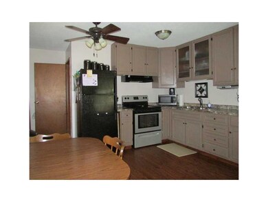 Kitchen. Small kitchen was made larger has many ca