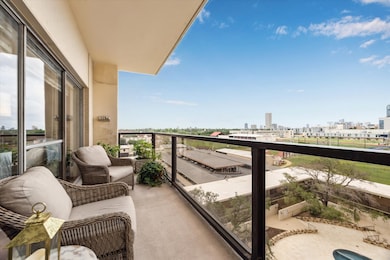 Expansive Covered Balcony overlooking pool, fields