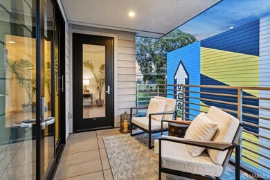 Enjoy peaceful outdoor space with a vibrant Mission District mural as your backdrop.