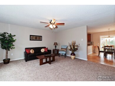 Living room opens to dining area