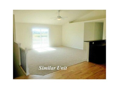 Living Room-L1. Picture is of Similar Unit.