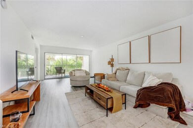 Living area with light wood-type flooring