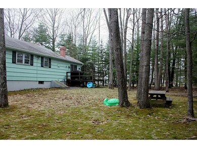 Back Yard. The home sits on a...