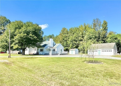 View of yard featuring an outdoor structure and a
