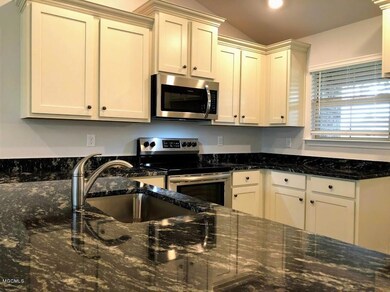Kitchen with granite countertops