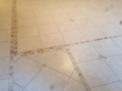 Ceramic tile flooring throughout the unit