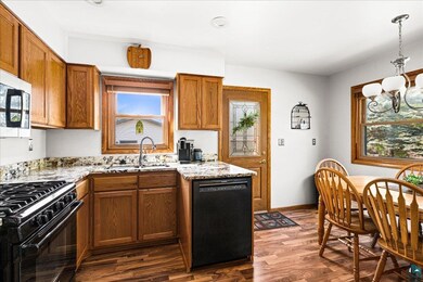Kitchen featuring black appliances and a healthy a