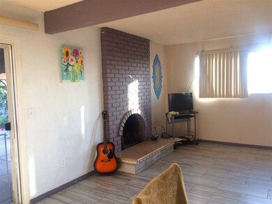 IN LIVING ROOM