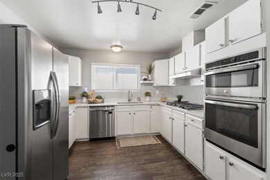 Kitchen with visible vents, stainless steel applia