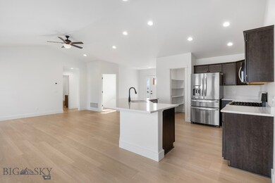 Extra room at entry and large pantry. Stainless Steel gas cooktop and french door refrigerator with ice/water in the door. R.O. water system included