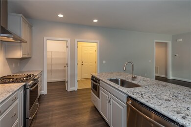 Photos are of a similar home in the community and