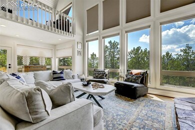 Sunroom with a baseboard radiator