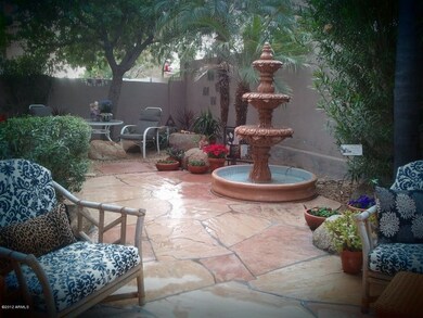 back patio and small back yard and fount