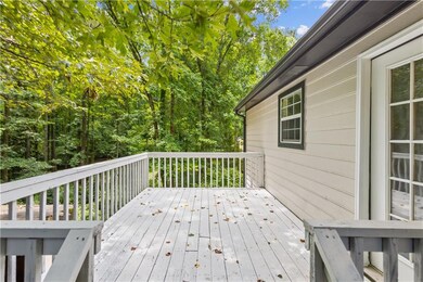 Ranch-style house with a porch and stairway