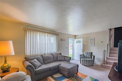 Bright and spacious living room with newer neutral