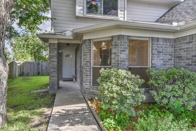 Covered front entrance. front gutters. Roof is 2017.