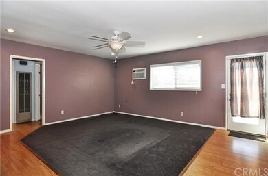 Living room looking left after you enter the home.