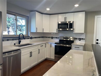 Upgraded quartz counters, new cabinets, stainless 