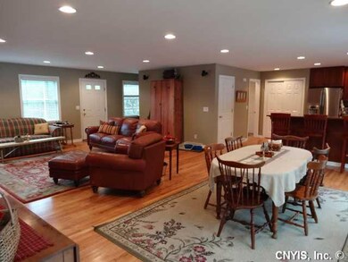 Living Room. Front door (towards left) opens to ni