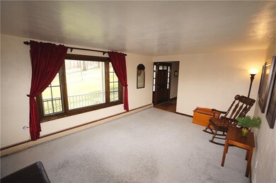 the inviting front porch leadsto a practical foyer