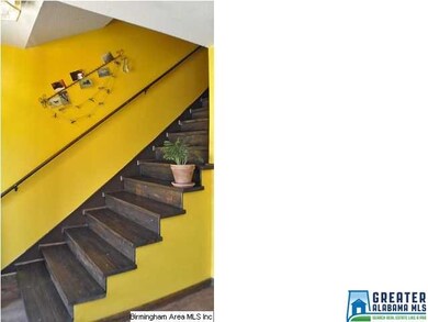 Great custom wood steps connecting first and secon