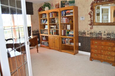 1st floor Den w glass door entry