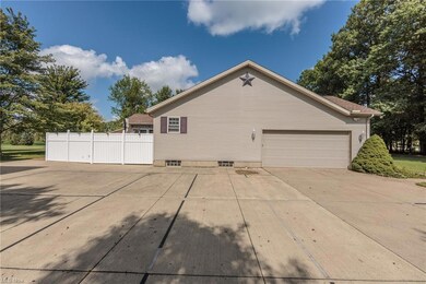 View of home's exterior featuring garage
