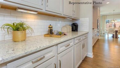 Butlers Pantry between dining room and kitchen