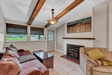 Woodburning fireplace in family room