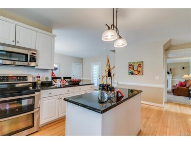 Large, stylish kitchen with adjacent eat-in area. 