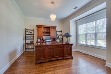 Dedicated Office with French Doors and Sand n Finish hardwood floors