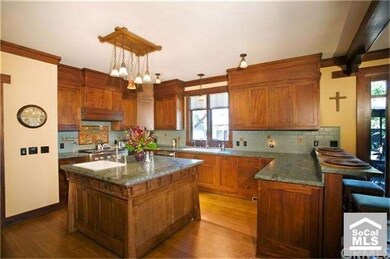 Beautiful kitchen with Mahogany cabinetry and soap