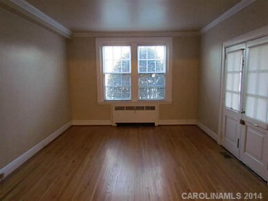 Living Room - Double doors lead out to the porch