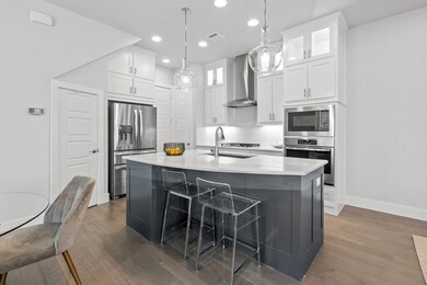 Kitchen featuring appliances with stainless steel 