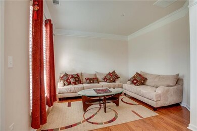 Seperate 11' x 12' living room offering hardwood floors.