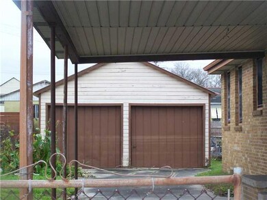 Parking Lot/Garage. LARGE DETACHED GARAGE/STORAGE