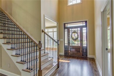 great foyer with lots of natural light, formal dining is off to the right upon entry