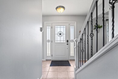 Welcoming entry way with a stunning new front door!