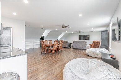 This 1,000 square foot finished room over the gara