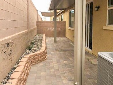 View of patio with a fenced backyard