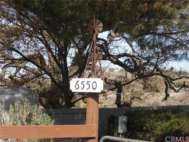 The front gate has the cute little windmill on the